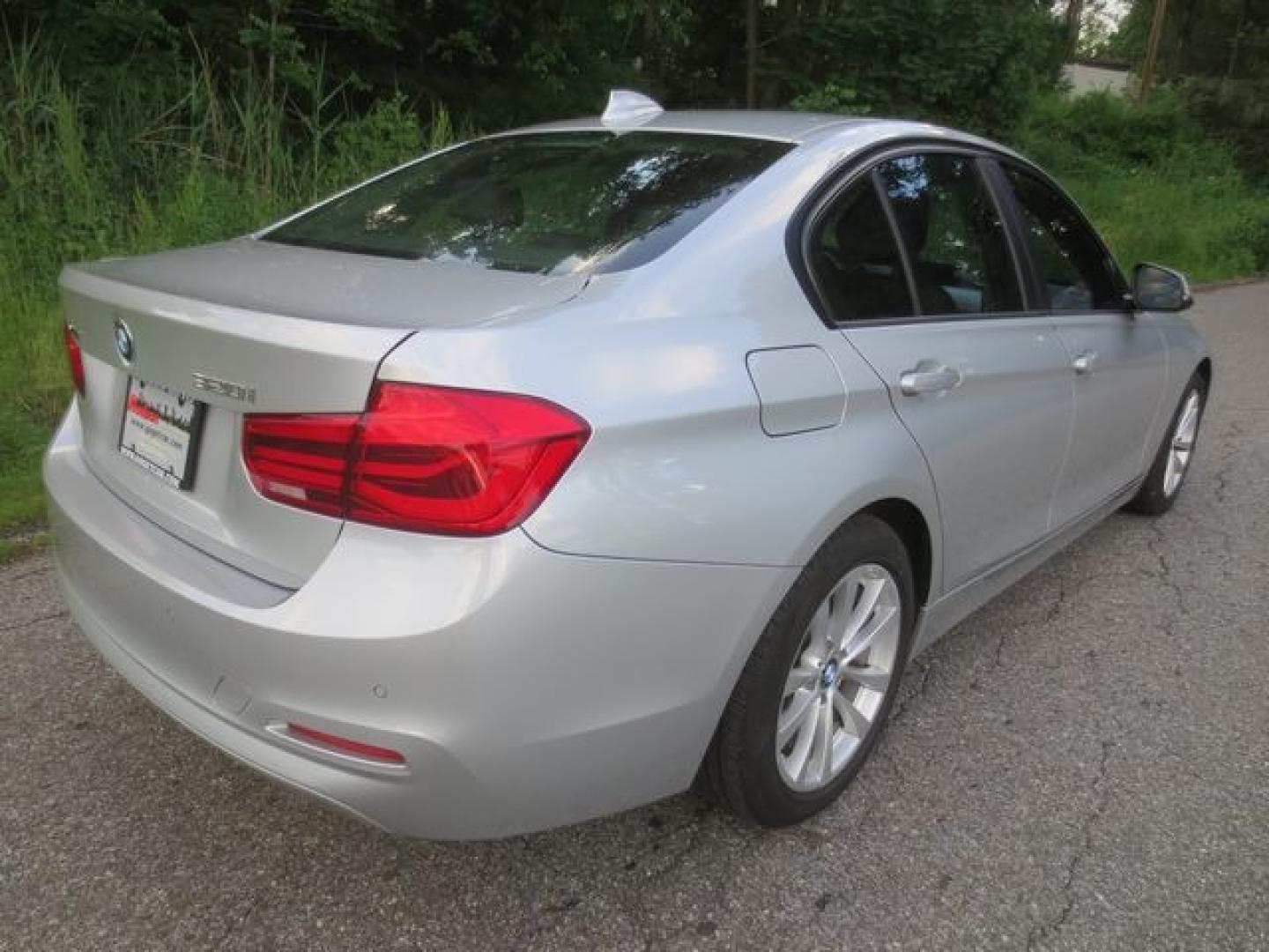 2016 Black /Black BMW 3-Series (WBA8E5G59GN) with an 2.0l 4cyl Turbo engine, Automatic transmission, located at 270 US Route 6, Mahopac, NY, 10541, (845) 621-0895, 41.349022, -73.755280 - Photo#3